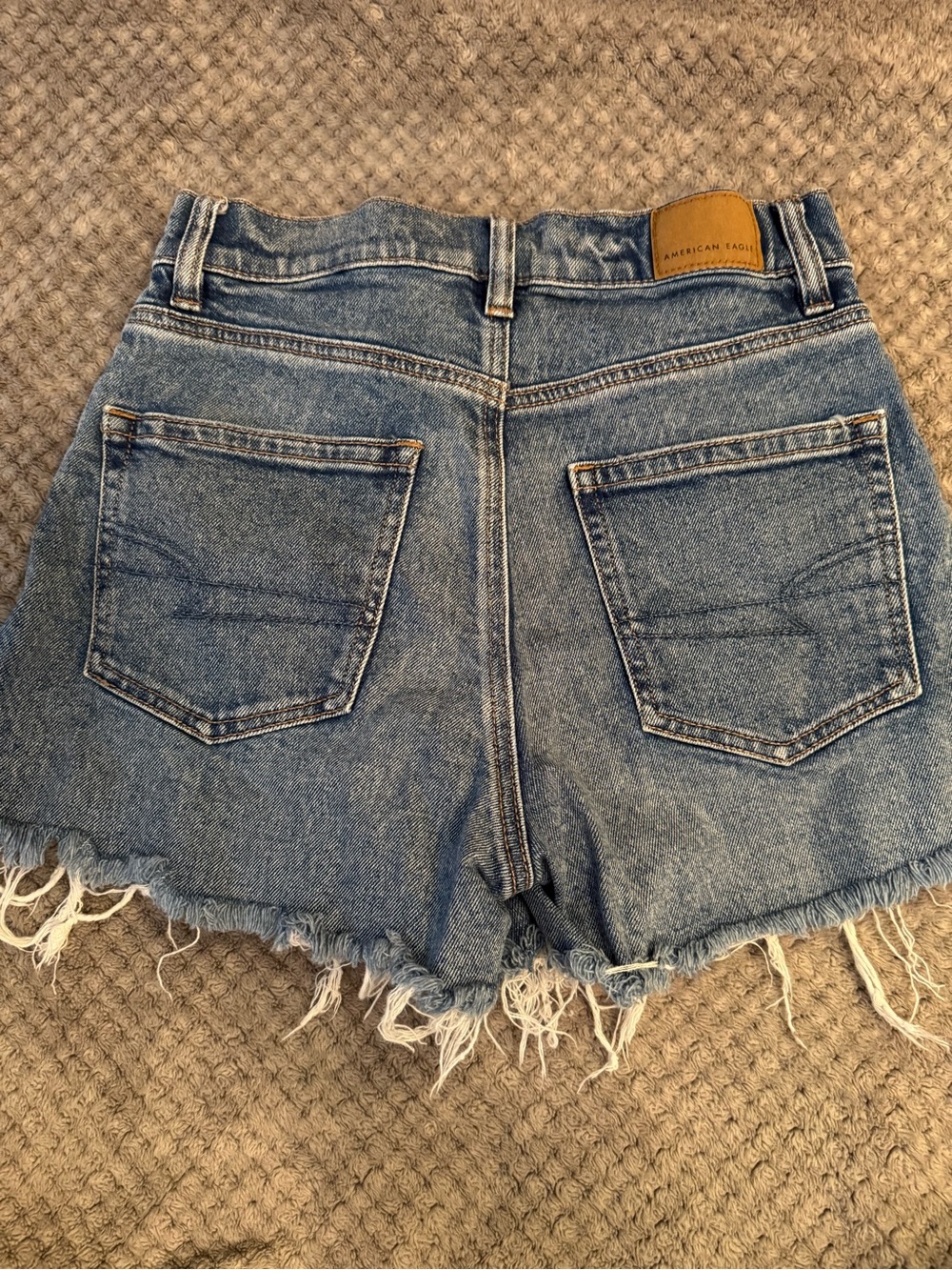 American Eagle Outfitters Light Blue High-Rise Frayed Hem Jean Shorts - Picture 2 of 3
